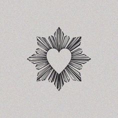 a black and white drawing of a heart in the middle of a starburst