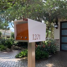 a mailbox with the number 1201 on it