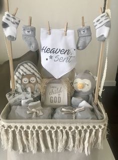 a baby gift basket with teddy bears and other items