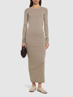 Crewneck. Model is wearing a size01 Extreme Cashmere, Cotton Long Dress, Knit Fabric, Long Dress, Knitted Fabric, The Dress, Cashmere, Long Sleeves, Crew Neck