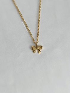 A sweet golden necklace that's so stunning on and matches everything. An absolute essential in every jewelry collection. Our chains are 100% stainless steel and hypoallergenic so they won't rust, tarnish, or turn your neck green. - Water resistant - Lobster clasp closure - Stainless steel chain + pendant - Select desired size at checkout Dainty Charm Necklaces For Gifts, Dainty Charm Necklace For Gift, Dainty Gold Plated Necklaces For Birthday, Dainty Gold-plated Necklace For Birthday, Dainty Gold Plated Necklace For Birthday, Hypoallergenic Gold Plated Necklace For Gift, Gold Clavicle Chain Charm Necklace As Gift, Adjustable Gold Charm Necklace For Gifting, Adjustable Gold Charm Necklace For Gifts