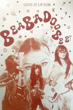 an advertisement for the band baddogs featuring two women with guitars and one man holding a guitar