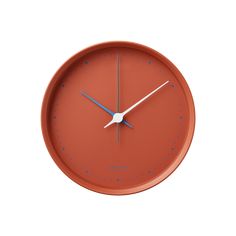 an orange clock with blue hands on a white background