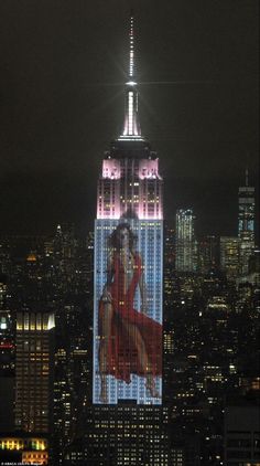 the empire building is lit up in red, white and blue