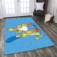 the rug is on the floor in front of a door with an image of homer and his family