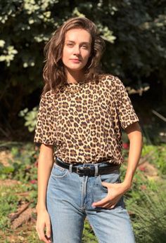 Leopard Printed Cotton Summer Crew Neck Tee Shirt for Every Day by YaelAdmoni. -------------------------- Short-sleeved T-shirt with a classic, flattering cut, featuring a black and brown leopard print and a round neckline. Made of 100% cotton. S-36-38 M-40 L-42-44 Summer Tee Shirts, Cotton T-shirt With Leopard And Graphic Print, Cheap Casual Leopard Print T-shirt, Cotton Leopard Print T-shirt With Graphic, Leopard Print Cotton T-shirt With Short Sleeves, Leopard Print Shirt, Animal Print Shirts, Casual Short-sleeved Tiger Print T-shirt, Brown Leopard