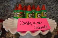 there is a sign that says candy - o - la - sokie on the counter