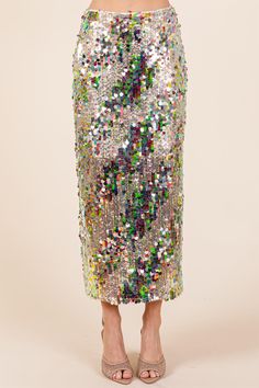 Turn heads and light up every room with our Confetti Dreams Sequin Midi Skirt! This show-stopping piece is fully adorned with shimmering silver and gold aurora sequins in two sizes, creating dynamic stripes that flow in a chic bias pattern. Perfectly festive and eye-catching, this skirt is made for holiday parties, New Year's celebrations, and any event where you want to stand out. The faced waistband offers a sleek fit, while the exposed gold back zipper adds a modern, luxe touch. Fully lined t Sequin Midi Skirt, Radiate Confidence, Sequin Embellishment, Curvy Dress, New Year Celebration, Curve Dresses, Cozy Sweater, Gold Sequin, Fitted Silhouette