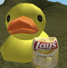 a yellow rubber duck holding a can of lays diapers in front of a mountain