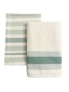 two towels with green and white stripes on them