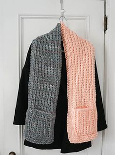 two scarfs hanging on a door with the text color blocked pocket scarf free knitting pattern by underground crafters