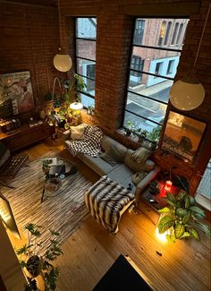 an overhead view of a living room with lots of windows