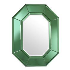 a mirror that is on the wall in front of a white background with green trim