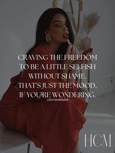 a woman sitting on top of a table next to a mirror with the words craveing the freedom to be at little selfish