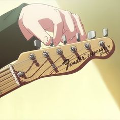 a person playing an electric guitar with their fingers on it's fretset