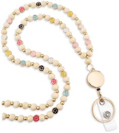 PRICES MAY VARY. 🥰 Bright & Cheerful Design: Features vibrant, handcrafted wooden beads with soft high-quality metal smiley faces, turning everyday wear into a fun and happy statement. 🥰 Lightweight & Practical: Crafted for comfort and convenience, this lanyard is ideal for securely holding badges, keys, and other essentials, making it both a functional and fashionable accessory. 🥰 Ideal Gift: Elegantly packaged, MyFavoriteK Lanyards are thoughtful presents suitable for everyone. - be it a wi Adjustable Beige Beaded Necklaces With Wooden Beads, Adjustable Beige Beaded Necklace With Wooden Beads, Adjustable Beige Wooden Beaded Necklaces, Teacher Lanyard, Id Badge Reels, Beaded Lanyards, Id Badge, Badge Reel, Lanyard