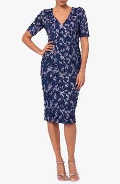 Sweetly stitched blooms cover every lovely inch of a fitted sheath cut to a beloved and versatile midi length. 40" length (size 8) Hidden back-zip closure V-neck Short sleeves Lined 95% polyester, 5% spandex Dry clean Imported Elegant Knee-length Floral Applique Midi Dress, Elegant Knee-length Midi Dress With Floral Applique, Spring Knee-length Midi Dress For Mother Of The Bride, Fitted Knee-length Midi Dress With Floral Embroidery, Fitted Floral Embroidered Midi Dress For Formal Occasions, Fitted Midi Dress With Floral Applique For Formal Occasions, Formal Fitted Midi Dress With Floral Applique, Formal Fitted Floral Embroidery Midi Dress, Formal Fitted Midi Dress With Floral Embroidery