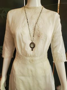 A lovely Edwardian era white dress. The eyelet appliques on the bodice adds a striking cut-out design. The bodice features delicate Valenciennes lace inserts which was very popular on these type of dresses , the waistband is also detailed with the same floral eyelet cut-outs. The long skirt has pin-tuck pleating as a feature design through out this darling dress. Condition: Very good for it's age Measurements: Bust: 36 inches Waist: 26 inches Hips loose up to 40 inches Dress length: 48 inches White Cotton Dress, Edwardian Dress, Prairie Dress, Darling Dress, Lace Insert, Edwardian Era, Cut Out Design, Types Of Dresses, Long Skirt