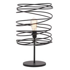 a light that is on top of a metal stand with spirals and lightshades