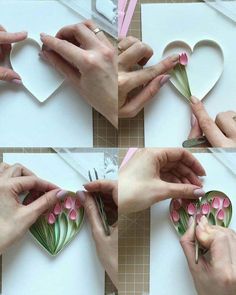 the hands are making paper flowers with scissors and glue on top of each other's fingers