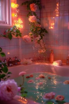 a bathtub filled with water and flowers next to a window covered in pink lights