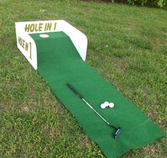 a hole in one golf putter on the grass