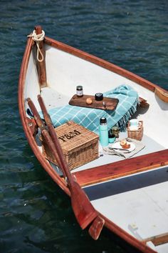 a small boat with some items in it