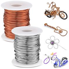 two spools of copper wire and several different types of metal wires on white background