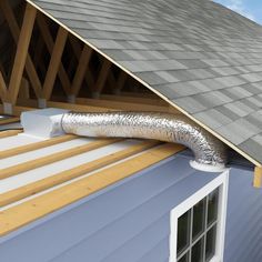 a gutter vent on the roof of a house