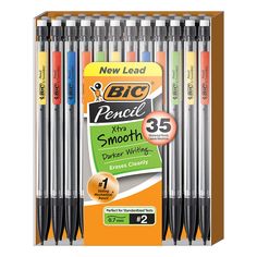 the new big pencils are lined up in a display case