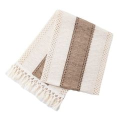 two white and brown towels on top of each other