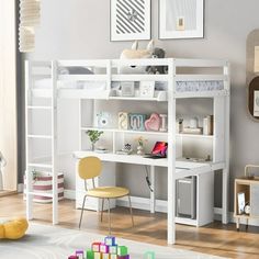 a child's bedroom with a loft bed, desk and toys on the floor