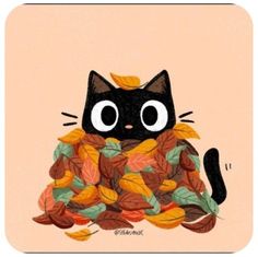 a black cat with leaves on it's back sitting in the middle of a pile of leaves