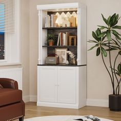 a living room with a chair and bookcase in it's corner, next to a potted plant