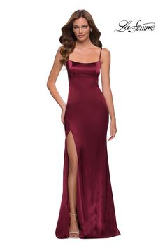 Indulge in the sophisticated elegance of the La Femme 29945 evening dress. Crafted from luxurious satin, this timeless beauty embraces your curves with a fitted silhouette. The low back, scoop neckline, and side slits add a touch of sensuality, ensuring all eyes are on you. Make magical memories in this enchanting piece of timeless beauty. Simple Prom Dress Long, Stretch Satin Dress, Straight Across Neckline, Modest Prom, Sheath Skirt, Prom Style, Floor Length Gown, Satin Gown, Burgundy Dress