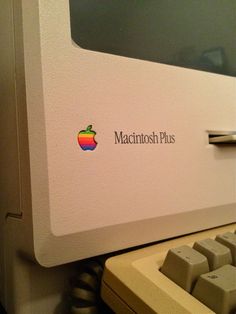 an apple macintosh computer with the words macintosh plus on it