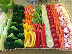 an assortment of vegetables are arranged in a basket on the table, including broccoli, carrots, peppers and celery