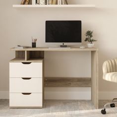 a computer desk with two drawers and a monitor on it's stand next to a chair