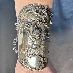 This Rare Piece Of Antique Sterling Silver Has Its Insignia Cherub Swinging From A Bouquet Of Flowers. It Has Been Transformed Into This Fabulous Cuff. I Upcycled And Recycled This Amazing Sterling Repouss Antique From Mauser Circa 1930 5"Inches Wide!! Fits Wrists 6.5 -6.75 Let Me Know If You Need Me To Adjust.. I Can Adjust It To Any Wrist Size 74.8 Grams Stamped, Sterling, Tested And Mauser Handmade And Imperfectly Perfect Vampire Ring, Art Nouveau Fashion, Antique Jewelry Victorian, Unique Jewelry Vintage, Victorian Bracelet, Antique Costume Jewelry, Elven Jewelry, Imperfectly Perfect, Brighton Bracelets