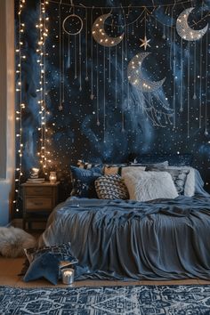 a bedroom decorated with stars and moon lights