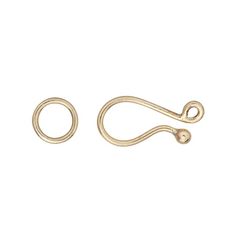 two gold hooks on a white background with one hook in the middle and another loop at the end