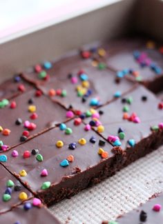 chocolate cake with colorful sprinkles in a box