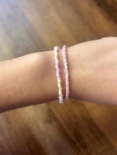 This small bracelet set features a combination of light pink, white, and tan to add softness and sweetness to your life. It is designed for a smaller wrist with the 8-strand braid at 10"and the twist braid at 8". Both use a simple loop and knot fastener. Manhattan Ks, Twist Braid, Strand Braid, Small Bracelets, Twist Braids, Braided Bracelets, Friendship Bracelet, Bracelet Set, Friendship Bracelets