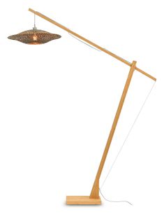 a wooden floor lamp with a dim light on it