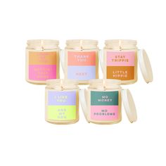 six small candles with different labels on them