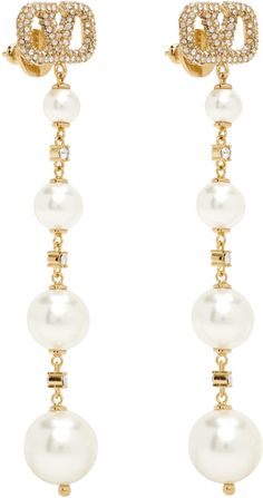 Find VALENTINO Gold Vlogo Signature Earrings on Editorialist. Pair of drop earrings in gold-tone brass. · Pavé-set Swarovski® crystals at logo hardware · Prong-set crystals and faux-pearls at drop · Post-stud fastening · H3 x W0.5 Supplier color: Gold Valentino Earrings, Valentino Jewelry, At Logo, Brass Jewelry, Heel Boots, High Jewelry, Pricing Jewelry, High Heel Boots, Valentino Garavani