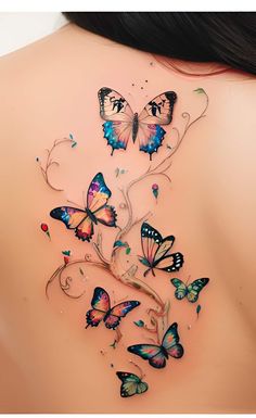 the back of a woman's shoulder with many butterflies on it, all over her body