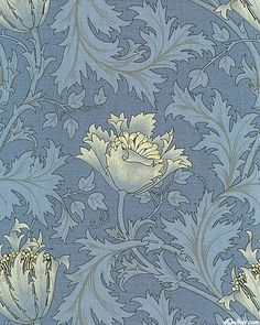 a blue and yellow floral wallpaper with white flowers on the left side, in an ornate pattern