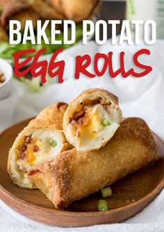 the cover of loaded baked pastry egg rolls on a plate with salad in the background