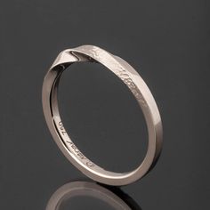 A Mobius style wedding band handmade in solid 18k gold. A segment of the mobius is gently hammered to a pleasant texture that adds another twist to this design. Wedding rings are hard to choose, by now I am sure you have seen dozens of rings and maybe you even got the feeling you have seen the same ring with different designers. If you are looking at my wedding ring collection then you probably want more. You want something different that suits your individual sense of aesthetics and you wont se Bark Wedding Ring, Fiance Ring, Mobius Ring, Twist Wedding Band, Rough Diamond Ring, Rough Diamond, Gold Wedding Rings, Ring Collections, White Gold Rings